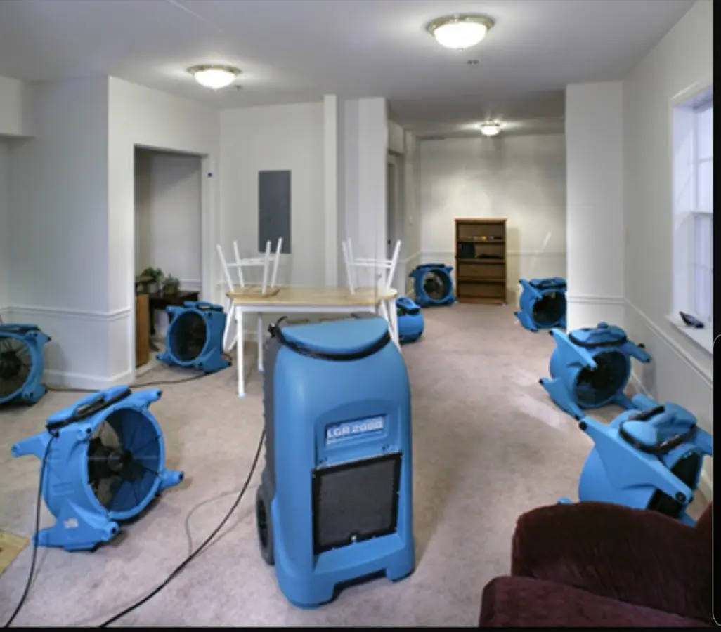 Air movers and dehumidifier setup for Water Extraction & Removal in Manchester